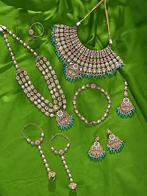 Multi-Layered Rajwadi Bridal Jewellery Set with Polki Stones & Green Beads