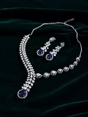 Adjustable Leaf Design Sterling Silver Necklace and Earring Set with Blue Gemstone