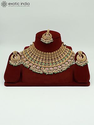 Embellished Stone Studded And Beaded Stunning Necklace With Earrings And Mangtika
