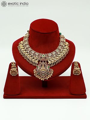 Traditional Goddess Lakshmi Stone Studded And Beaded Necklace With Earrings