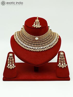 Beaded And Stone Studded Attractive Choker Necklace With Matching Earrings And Mangtika