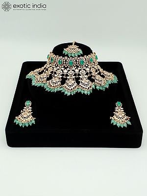 Embellished Floral Design Stone Studded And Beaded Choker Necklace With Earrings And Mangtika