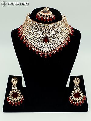 Choker Design Stone Studded And Beaded Necklace With Matching Earrings And Mangtika
