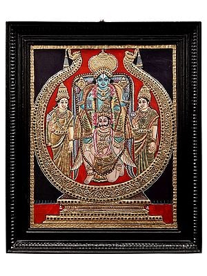 Lord Vishnu Sitting on Garuda With Sridevi and Bhudevi Tanjore Painting | Traditional Colors With 24K Gold | Teakwood Frame | Gold & Wood | Handmade | Made In India