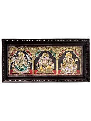Ganesha with Lakshmi & Saraswati Tanjore Painting | Traditional Colors With 24K Gold | Teakwood Frame | Gold & Wood | Handmade | Made In India