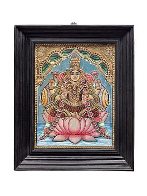 Goddess Dhana Lakshmi Seated on Lotus Tanjore Painting | Traditional Colors With 24K Gold | Teakwood Frame | Gold & Wood | Handmade | Made In India