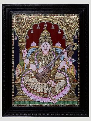 Tanjore Painting of Goddess Saraswati on Throne | Traditional Colour With 24 Karat Gold | With Frame