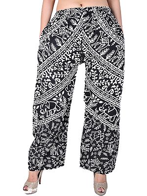 Ivory And Black Casual Trousers With Printed Elephants And Camels