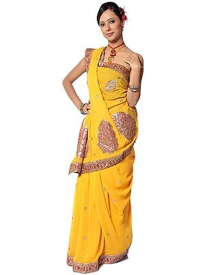 A Georgette Sari in Golden Yellow