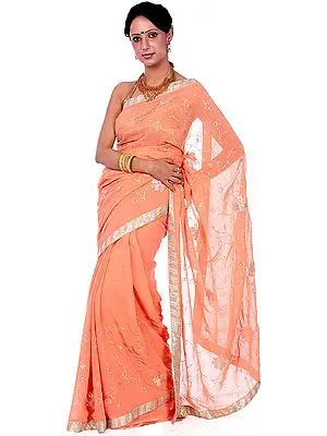 Melon-Orange Sari with Sequins Embroidered as Flowers and Gota Border