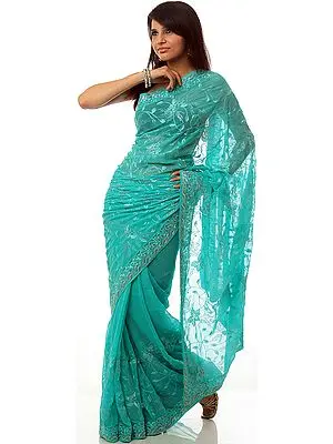 Turquoise-Blue Sari with Bootis Woven in Self and Aari-Embroidered Flowers All-Over