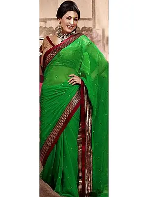 Plain Green Designer Sari with Patch Brocaded Border