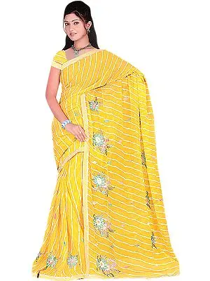 Spectra-Yellow Printed Leheria Sari with Embroidered Flowers and Patch Border