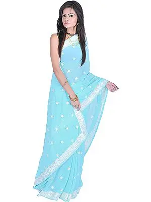 Turquoise Designer Sari with Thread Embroidered Flowers All-Over