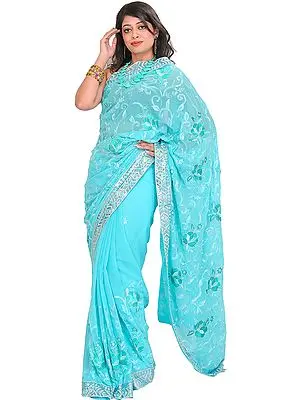 Blue-Curacao Sari with Floral Embroidery and Sequined Patch Border