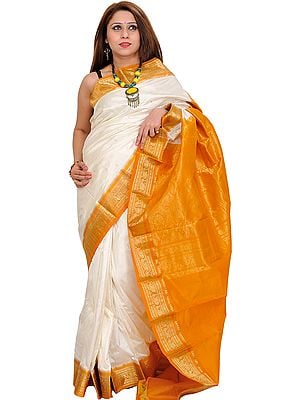 Ivory and Amber Sari from Bangalore with Woven Bootis and Brocaded Aanchal