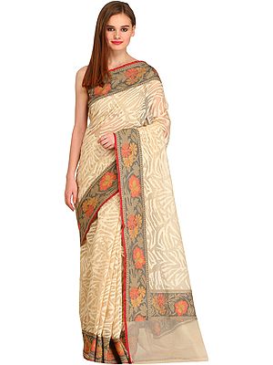 Cream Self-Weave Net Saree from Banaras with Hand-Woven Flowers on Border
