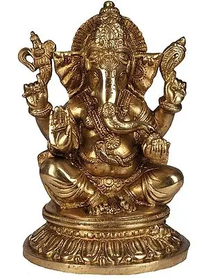 Baby Ganesha Enjoying Modak