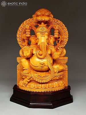 22" White Wood Ganesha Idol Sitting Under Kirtimukha Prabhavali