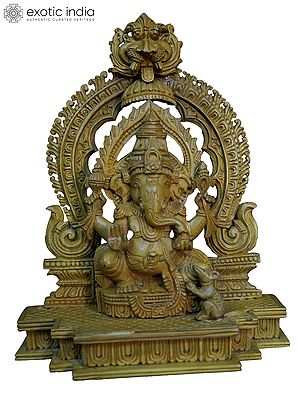 7" Lord Ganapati Seated On Kirtimukha Throne With Mushak | Handmade White Wood Statue