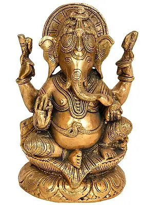 7" Four-Armed Ganesha Seated in Royal Ease Posture In Brass | Handmade | Made In India