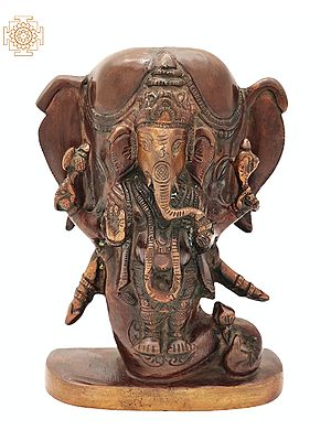 5" Brass Lord Ganesha Idol Standing in the Backdrop of Elephant Head
