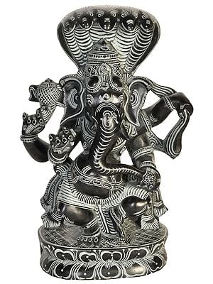 Dancing Ganesha with Five-hooded Sheshnag Canopying Over It