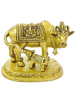 Cow and Calf: Saddle Decorated with Lakshmi-Ganesha figures