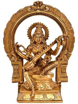 9" Goddess Saraswati Seated on Throne with Floral Aureole In Brass | Handmade | Made In India