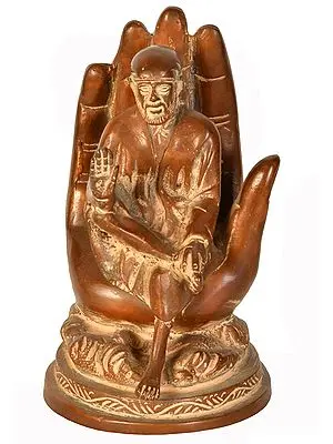 Sai Baba Seated on A Hand Throne