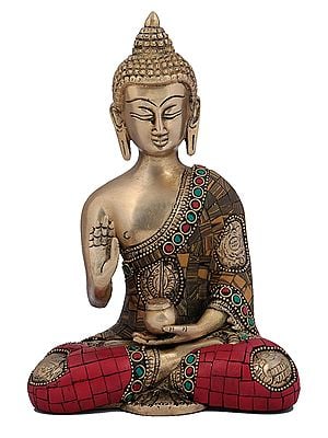The Slender Buddha, Seated With His Hand Raised In Blessing