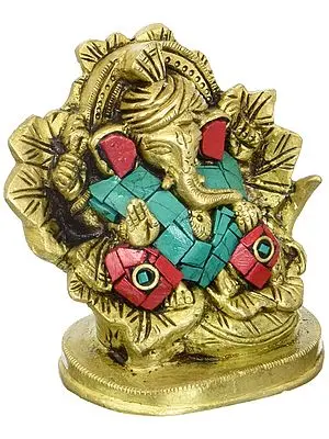 Beturbaned Ganesha Seated On A Lusciously Leafy Throne