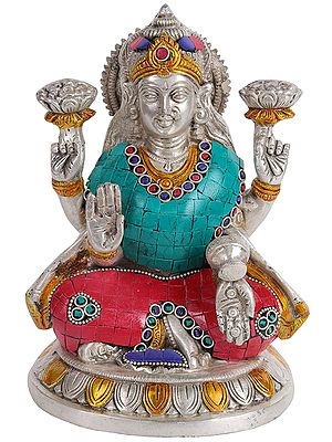 Lakshmi Seated On An Upturned Lotus, With Fresh Lotuses In Her Hands