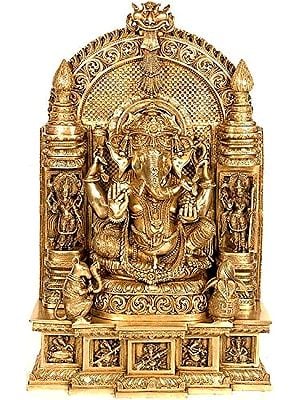 35" Ganesha Seated in Royal Ease Posture Flanked by Lakshmi and Saraswati With Pedestal Depicting Aspects of Ganesha as Musician In Brass | Handmade | Made In India