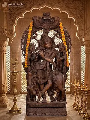 Large wooden Fluting Krishna with Kirtimukha Throne