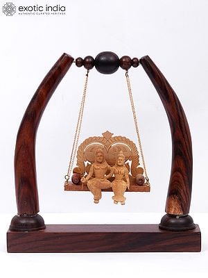 9" Wood Idol Of Radha And Krishna Sitting On The Swing