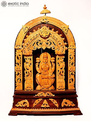 17" Four Armed Sitting Goddess Lakshmi on Kirtimukha Throne | Sandalwood Carved Statue