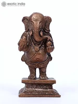 3" Small Standing Lord Ganesha Copper Statue Eating Modak