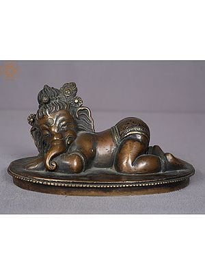 6.5" Bal Ganesha Relaxing Brass Sculpture from Nepal