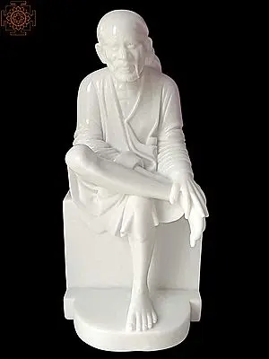 Sai Sitting In White Marble