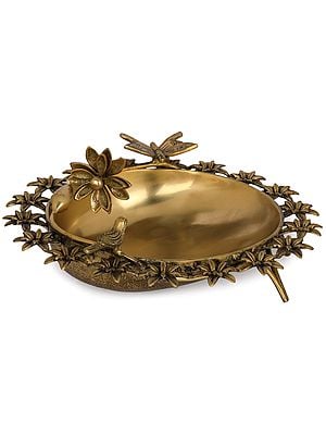 Designer Brass Urli Surrounded with Flowers and Perched Butterfly and Bird