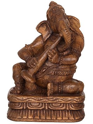 Ganesha Idol Playing Shehnai Sculpted in Dark Brown Wood