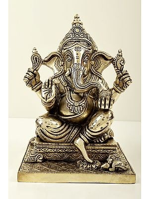 9" Lord Ganesha Seated on Pedestal and Eating Modak | Brass Bhagawan Ganesha | Brass Statue | Handmade | Made In India