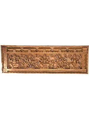 A Rare Shaivite Wooden Temple Panel (From the Left - Shri Ganesha, Shiva Destroying Andhakasura, Seated Parvati, Durga Destroying Mahishasur and Seated Shiva with Ganas and Attendants)