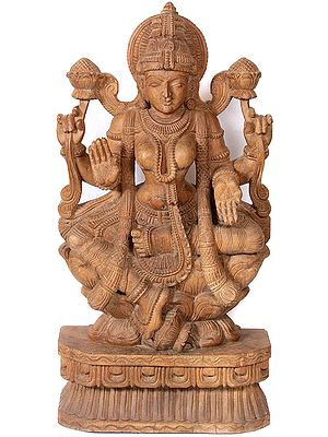 South Indian temple-style wood carving of Goddess Lakshmi
