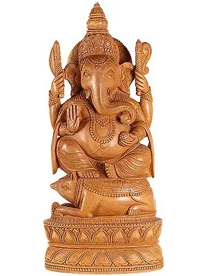 Lord Ganesha Enjoying Modak (Laddoos) Seated on Rat on Lotus Pedestal
