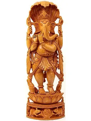 Lord Ganesha Playing Flute with Serpent Hood Over His Head