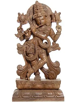 Lord Krishna, Absorbed in Playing His Flute