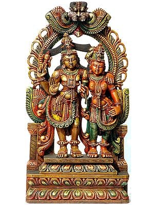 Shiva Parvati Standing on Lotus Pedestal with Floral Aureole and Kirtimukha Atop
