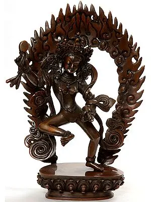 Yogini Holding Damaru and Vajra-Bell